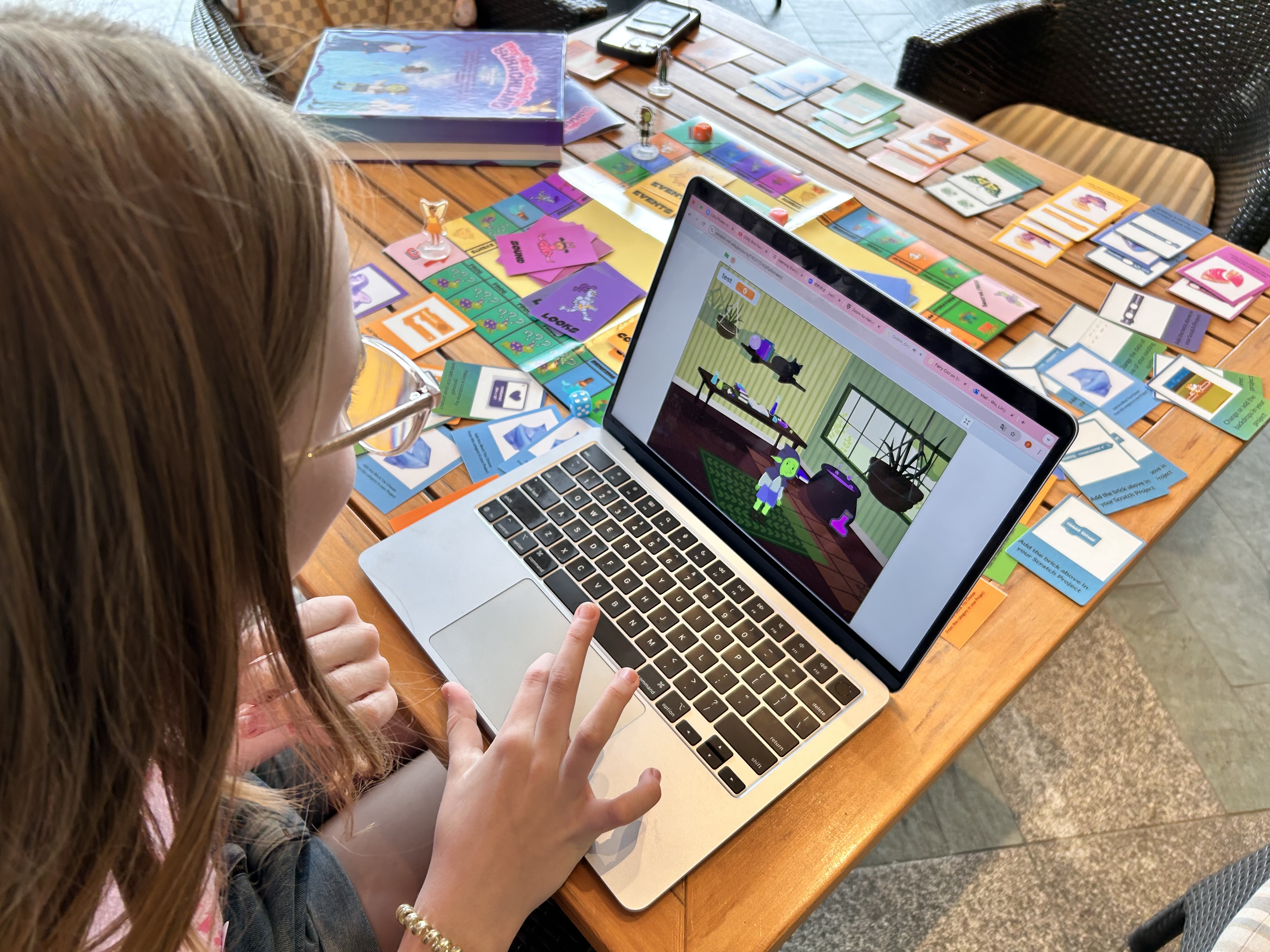 Children collaborating on computational thinking activities